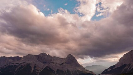 Wall Mural - sky and mountain timelapse. a cloudy morning atmosphere in the summer season. natural landscape back