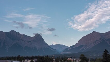 Wall Mural - sky and mountain timelapse. a cloudy morning atmosphere in the summer season. natural landscape back