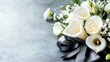 ©  alvi sandani - White funeral flowers with grey background.