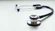 ©  VladaToday - Stethoscope on white background with copy space for medical or healthcare concepts