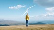 © bambang - Woman stands on mountaintop, wind turbine backdrop