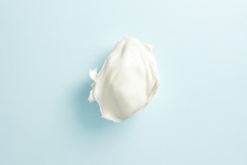 Aufkleber - Creamy white substance placed on a light blue background for artistic presentation and culinary inspiration