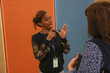 © Caia Image - Coworkers�using sign language in office