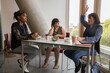 © Caia Image - Women enjoying lunch in office