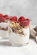 © Mariya Surmacheva - yogurt with granola and raspberries