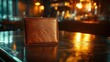 © dewi - Brown leather placemat on a bar table.  Soft lighting in a dimly lit restaurant