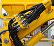 © pavel_812 - Power hydraulic fittings hoses and tubes of large construction machine