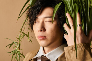 spring fashion showcase featuring a stylish man against a warm studio backdrop