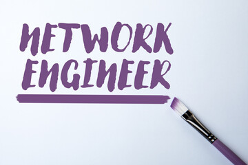 Wall Mural - network engineer concept with purple brush and text on light background