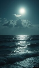 Leinwandbilder - Tranquil ocean waves shimmering under a bright sun, with soft clouds adding depth to the clear sky