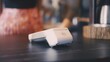 © Synthex - Card terminal on wooden counter in coffee shop, contactless payment system