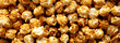 © Liudmyla - Homemade Caramel Popcorn in a Bowl, top view.