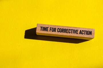 Leinwandbilder - Time for corrective action message written on wooden block on yellow background. Conceptual time for corrective action symbol. Copy space.