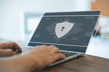 Wall Mural - laptop shows the icon lock shield for cybersecurity. concept of secure privacy data, protect cybercr