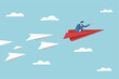© Sector30 - Leadership to guide team direction lead to success, determination or decision to motivate team, power to control or influence people concept, confident businessman lead other paper airplane origami.