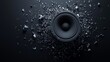© Aris Suwanmalee - A broken speaker surrounded by shattered glass pieces on a dark background.