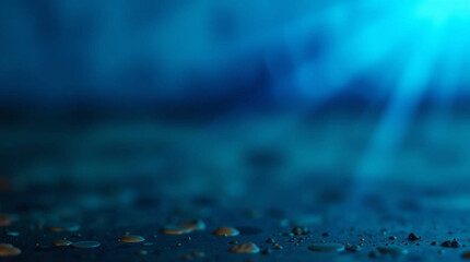 Abstract blue technology design features clear water drops on a bright glass texture