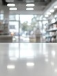 © DriftPixels - Serene interior view of a store with a bright white counter and blurred background creating a calming and minimalist atmosphere for shopping or browsing