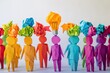 © afterfast - Colorful paper figures, representing a group of people, with crumpled paper thoughts and a lightbulb idea