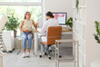 © Pixel-Shot - Young woman visiting gynecologist in clinic