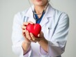 © MD. NADIM MAHMUD - Doctor holding red heart