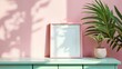 © Fuzzy08 Design - Pastel pink photo frame on mint green table with tropical plant shadows
