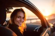 © Aditya - A woman smiling, enjoying the beautiful sunshine in her car