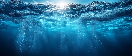 Fototapete - Underwater Sunlight Streaming Through Ocean Waves Blue Sea Water Surface with Bubbles and Light Rays Nature Photography : Generative AI