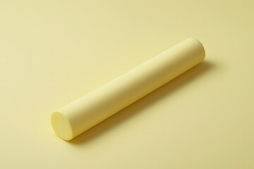 Wall Mural - minimalist yellow cylindrical object on soft yellow background