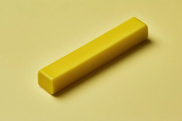Wall Mural - bright yellow rectangular block on soft yellow background surface