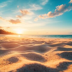 Wall Mural - serene golden sandy beach at sunset with soft waves and warm sunlight casting long shadows across te