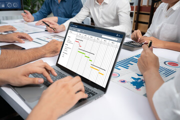 Aufkleber - Project planning software for brisk business project management on the computer screen showing timeline chart of the team project