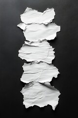 Leinwandbilder - Five Torn Pieces of White Paper Stacked Vertically on Black Background for Texture Grunge and Mockup Concepts : Generative AI