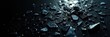 © Makaron - A dramatic close-up of shattered glass pieces glistening under soft light, perfect for themes of fragility, danger, or transformation.