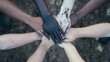 © Khritthithat - Diverse Hands Coming Together in Unity Symbolizing Cooperation, Support, and Connection Among Different Cultures and Backgrounds in Earthy Environment