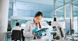 © peopleimages.com - Scientist, woman and tablet with research for biology, innovation or medical notes analysis. Biotech, laboratory and microscope with DNA study for pharmaceutical RNA or pathology experiment project