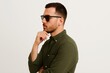 © michnik101 - Profile of pensive man wearing sunglasses. modern thoughtful expression concept