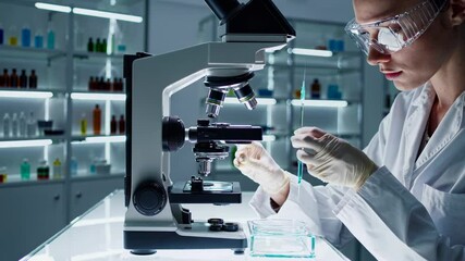 Poster - Researcher examines samples under microscope in modern laboratory setting during day time