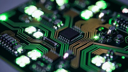 Aufkleber - Close up view of a circuit board with green lights illuminating intricate pathways and components in a tech workshop