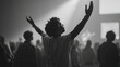 © Tahsin - Black and white worship concert photography with crowd and man raising hands in praise and adoration