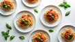 © Cyber Shutter - Classic Italian linguini pasta featuring tomatoes and basil set against a white backdrop.