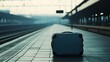 © VK Studio - An abandoned suitcase rests on an empty train platform, hinting at untold stories and missed connections in a tranquil, wistful scene.