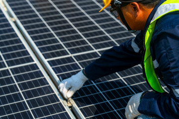 Wall Mural - team of professionals installs solar panels, ensuring energy efficiency and sustainable development.