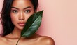 © AI04 - The picture portrays a beautiful young woman with a healthy and smooth complexion, natural nude makeup, and a green tropical leaf, as she peers into the hole of a colored paper