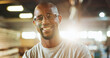 © peopleimages.com - Workshop, black man and happy in portrait for carpenter, wood manufacturing and production business. Confidence, contractor and male person with glasses for safety, maintenance and plank renovation