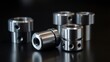 © thenort - Close-up of precisely machined metal parts with threaded inserts and multiple holes, arranged on a dark reflective surface.