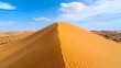 © Biggy - Serene Sand Dune Landscape Under Bright Blue Sky and Clouds