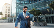 © CC/peopleimages.com - City, walking and businessman check watch for morning commute, travel and work schedule. Corporate, professional and person with rush or hurry for time management, meeting and appointment in town