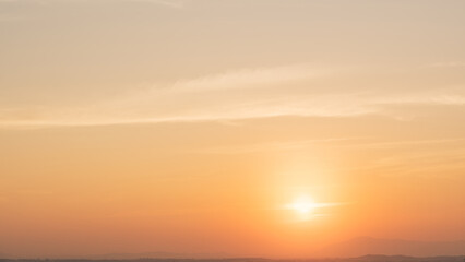 Fototapete - Sunset sky clouds countryside in the evening with orange sunlight clouds in golden hour sun dawn, Horizon sky landscape Backgrounds