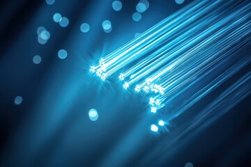 Wall Mural - blue fiber optic lights glowing in a dark background for technology use